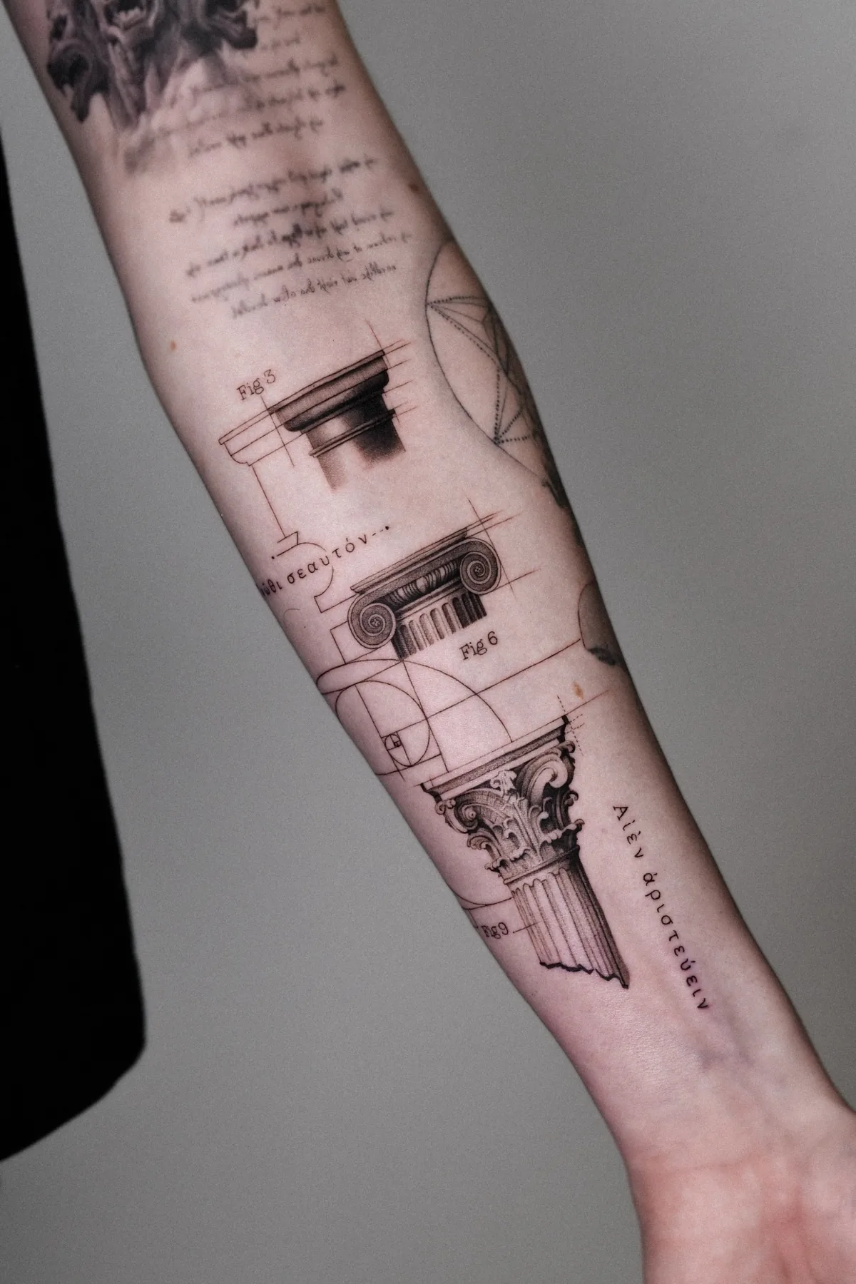 Three Greek columns tattoo